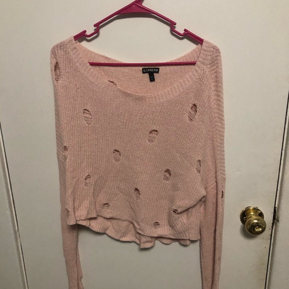 pink ripped sweater